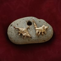Unidentified creatures in bronze