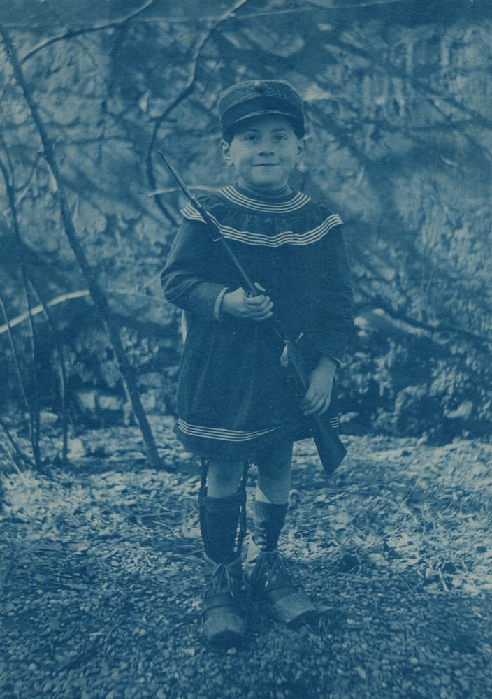 Image of Unknown: boy with a rifle, France ca. 1900