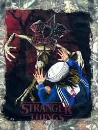 Image 1 of “TORMENT AT HAWKINS” CAMO TEE!