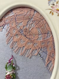 Image 2 of Floral Lace Spider crawling up Web