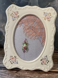 Image 1 of Floral Lace Spider crawling up Web