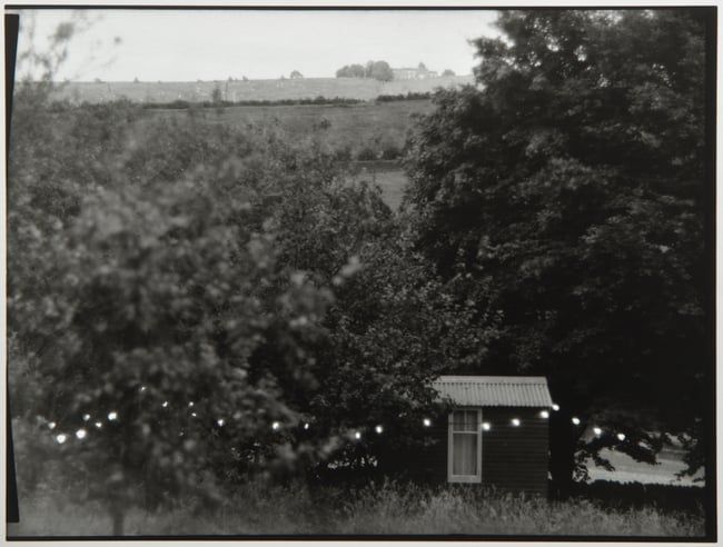 Fairy lights and shepherds hut.