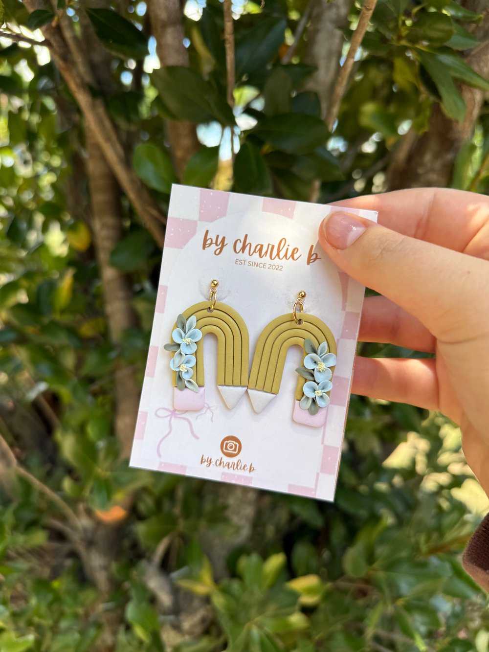 Image of arch pencil floral dangles