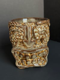 Image 1 of Floating Brown Tiki