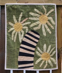 Image 1 of The cheeriest bringer of life and death