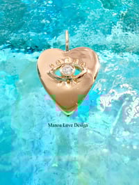 Image 1 of 14k solid gold diamond evil eye heart pendant 