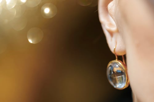 Image of "Rays of the sun..." gold plated silver earrings with rock crystals · RADII SE INTER NUBILA... ·