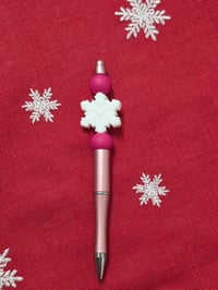 White and pink snowflake pen 