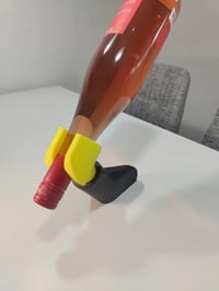 Image 2 of 🧱🍷 Brick-Style Wine Bottle Holder – Lego Arm–Inspired Wine Display 🍷🧱