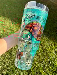 Image 1 of 40oz Acrylic Turtle Snow Globe Tumbler