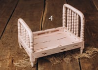 Image 1 of Beaded Spindle Baby Bed