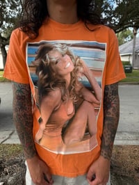Image 1 of Orange Farrah Fawcett Integrity X Dark Empire shirt 