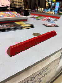 Image 2 of Slappy Red parking curb