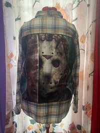 Image 1 of Masked man