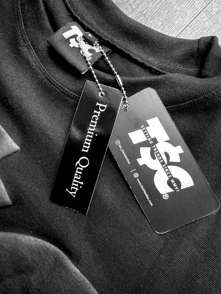 Image of T$C Fade to Black embossed logo