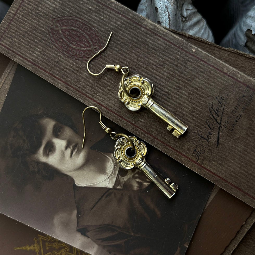 Ornate key earrings on gold plated hooks
