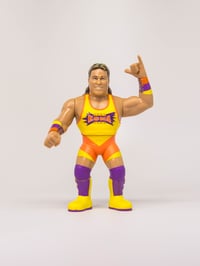 Image 1 of *EXPECTED LATE JANUARY:* KONA BRIAN ADAMS WRESTLE-SOMETHING WRESTLERS SERIES 4 (YELLOW)