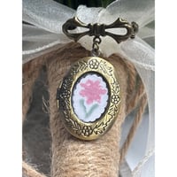 Image 1 of Oval Locket with Bowknot Brooch: Handpainted Flower Design Bridal Bouque, Groom Attire
