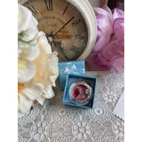 Image 1 of Vintage Silver Round Locket With Dried Pink/Red Flower Centerpiece