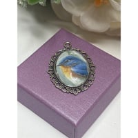 Image 1 of Handcrafted Bluebird Oval Pendant | Made from Vintage Stamp | Upcycled | 18x25