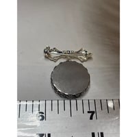 Image 3 of Bridal Bouquet Charm: Forget-Me-Not Flowers on Pearlescent Background | Silver Bowknot Brooch