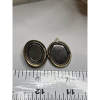 Image 3 of Antique Gold Oval Locket | Iridescent Opal-Like Center &amp; Floral Design