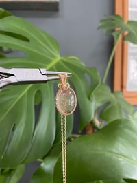Image 4 of Gold Oval Garden Quartz Crystal Necklace