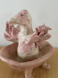 Image 1 of Clay: The Goose in a pink bathtub