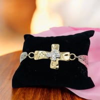 Image 1 of Gold and silver cross bracelet 