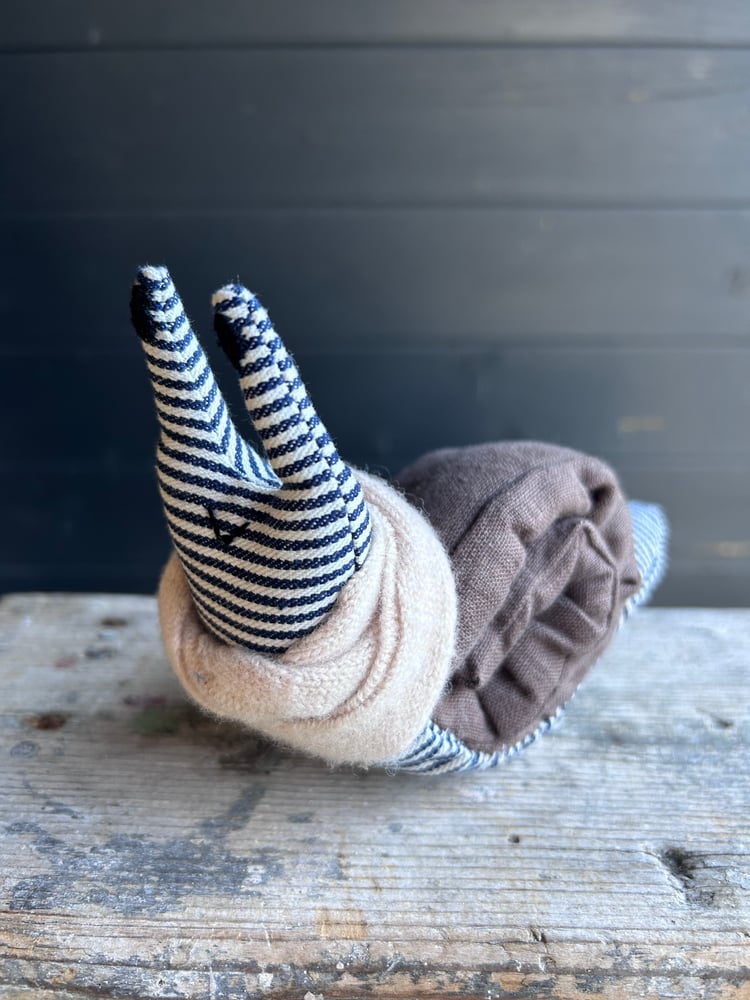 Image of Small Handmade Brown Linen Snail Wearing A Cream Woollen Scarf