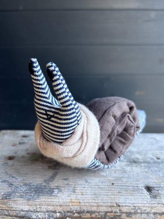 Image of Small Handmade Brown Linen Snail Wearing A Cream Woollen Scarf