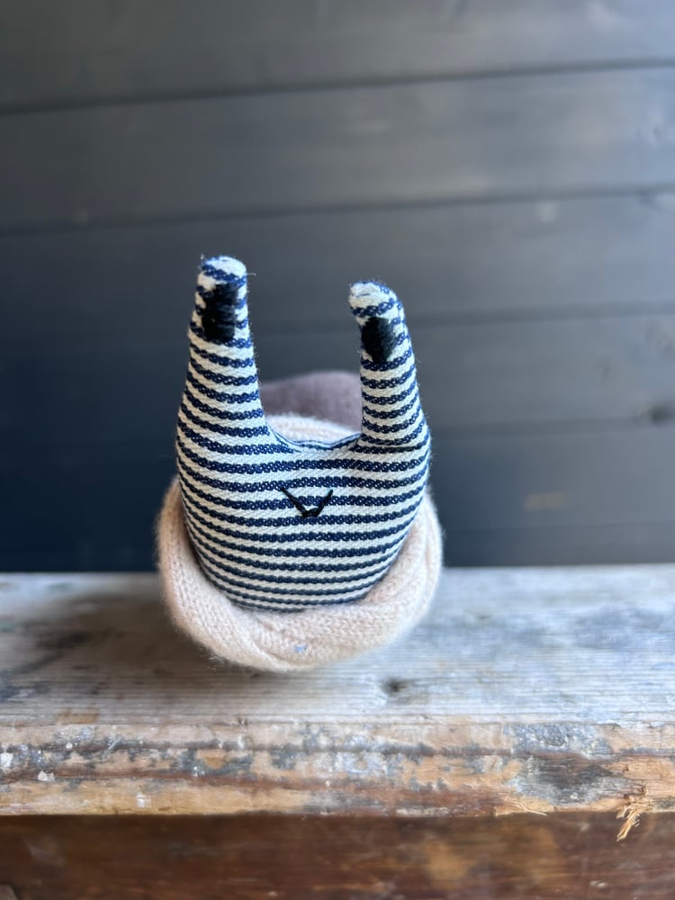 Image of Small Handmade Brown Linen Snail Wearing A Cream Woollen Scarf