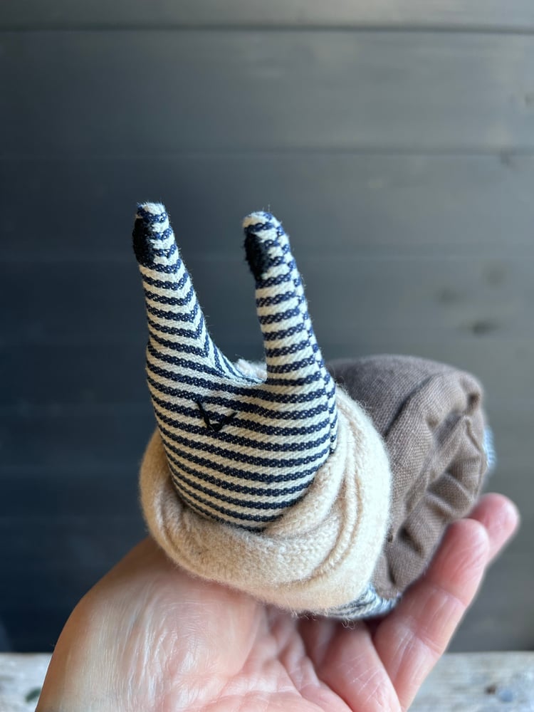 Image of Small Handmade Brown Linen Snail Wearing A Cream Woollen Scarf
