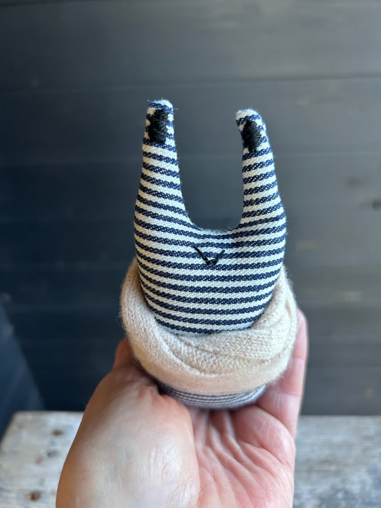 Image of Small Handmade Brown Linen Snail Wearing A Cream Woollen Scarf