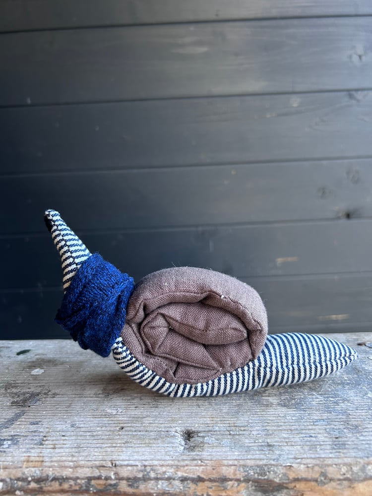 Image of Small Handmade Brown  Linen Snail Wearing A Blue Woollen Scarf