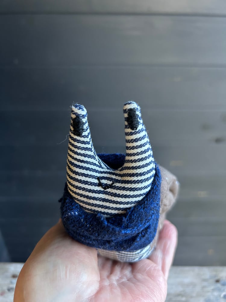 Image of Small Handmade Brown  Linen Snail Wearing A Blue Woollen Scarf