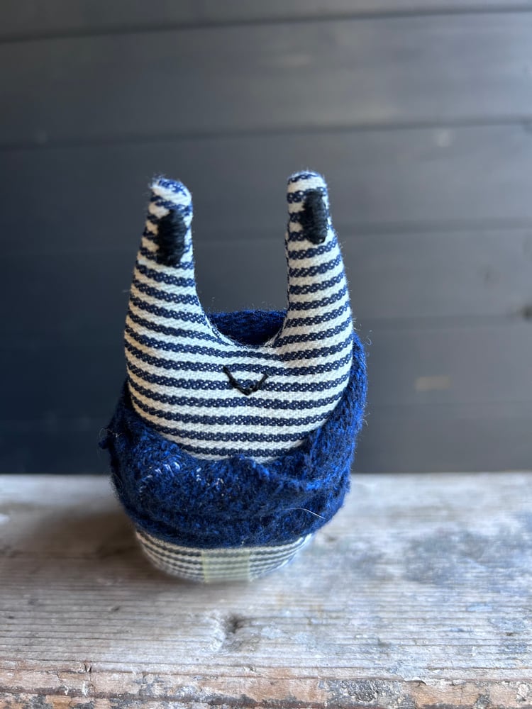 Image of Small Handmade Brown  Linen Snail Wearing A Blue Woollen Scarf
