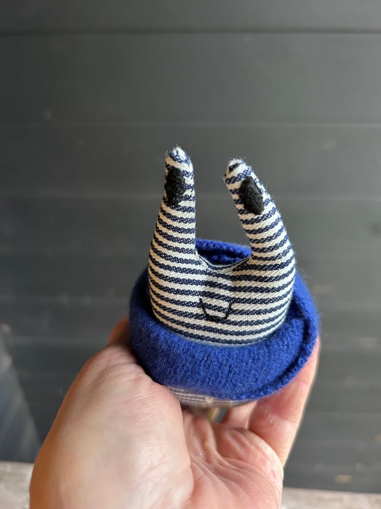 Image of Small Handmade Natural Linen Snail Wearing A Blue Woollen Scarf