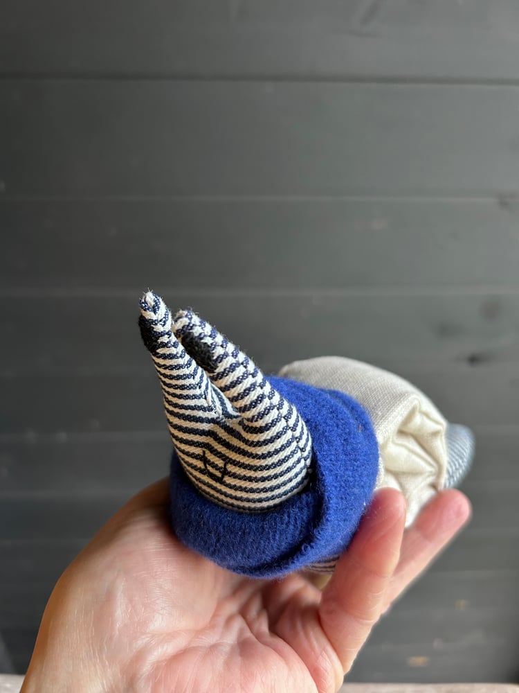 Image of Small Handmade Natural Linen Snail Wearing A Blue Woollen Scarf