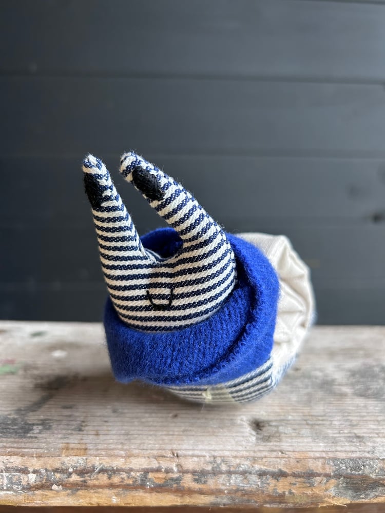 Image of Small Handmade Natural Linen Snail Wearing A Blue Woollen Scarf