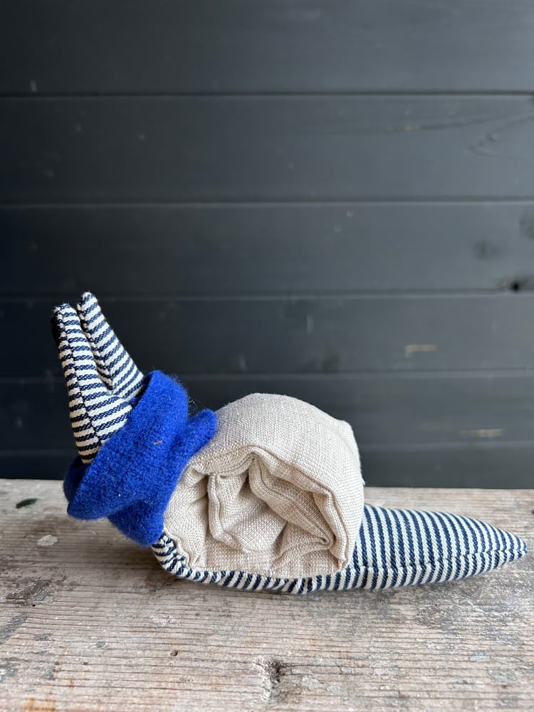 Image of Small Handmade Natural Linen Snail Wearing A Blue Woollen Scarf