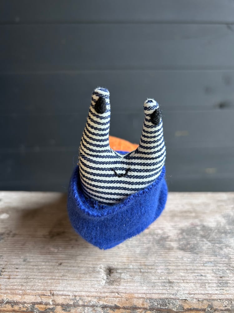 Image of Small Handmade Orange Linen Snail Wearing A Blue Woollen Scarf