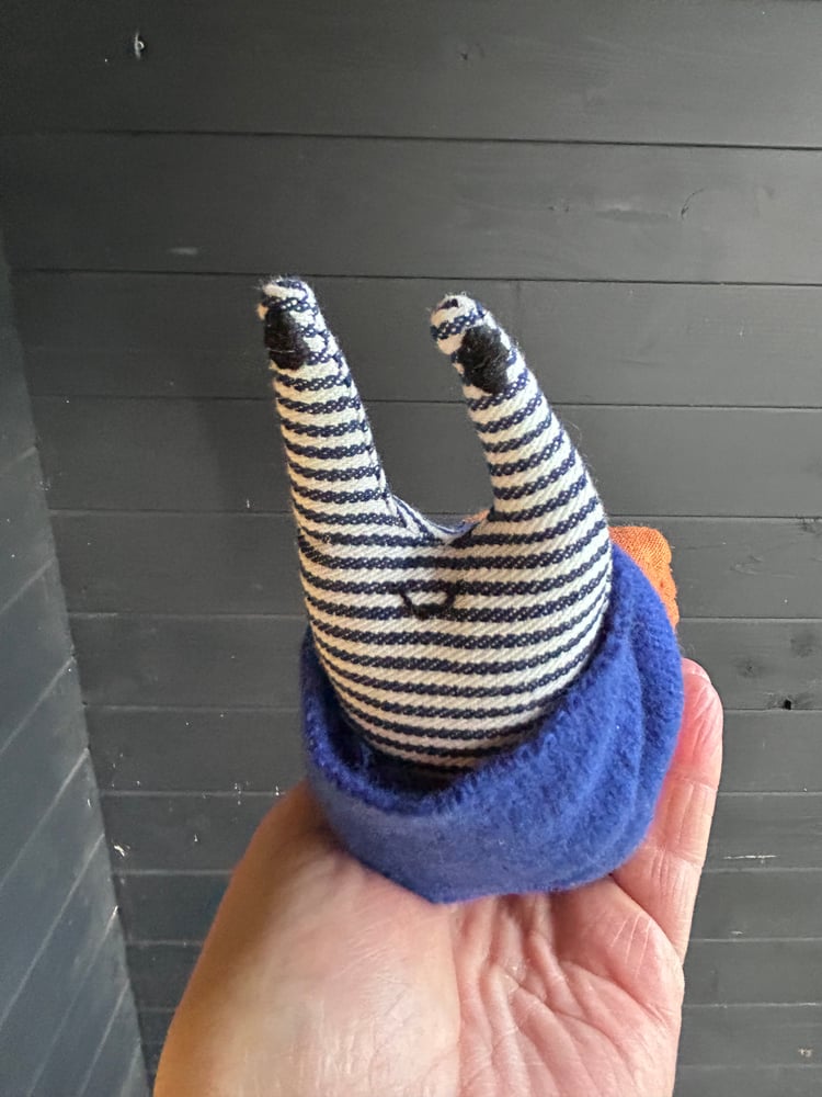 Image of Small Handmade Orange Linen Snail Wearing A Blue Woollen Scarf