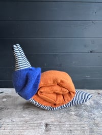 Image 3 of Small Handmade Orange Linen Snail Wearing A Blue Woollen Scarf