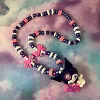 Image 1 of Kawaii Black White Character with Balloon Dog Kandi Necklace
