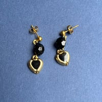 Image 1 of Boucles « MEDEIROS »