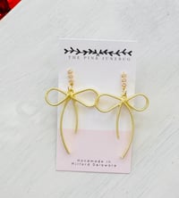 Gold metal bows 