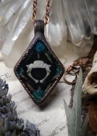 Image 1 of Piglet Vertebra and Floral Pendant - Blue