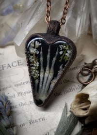 Image 2 of Rabbit Claw and Floral Heart Pendant 