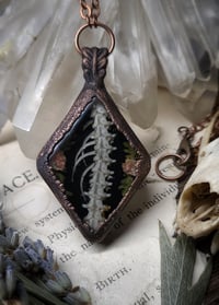 Image 1 of Snake Spine and Floral Pendant